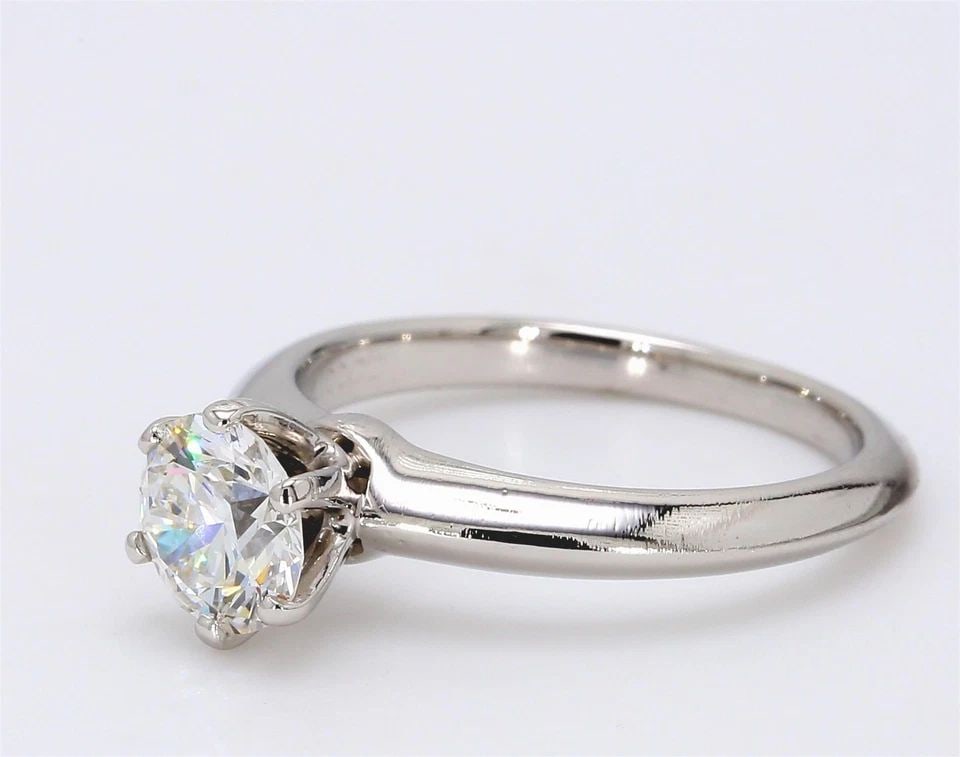 TIFFANY & CO.. 1.00 CARAT F-VVS2 DIAMOND PLATINUM ENGAGEMENT RING: TIFFANY & CO.. 1.00 CARAT F-VVS2 DIAMOND PLATINUM ENGAGEMENT RING Title: Tiffany and Co 1.00 Carat Round Brilliant Shape F-VVS2 Diamond Platinum Engagement Ring Style: Engagement Metal: Platinum Gemst