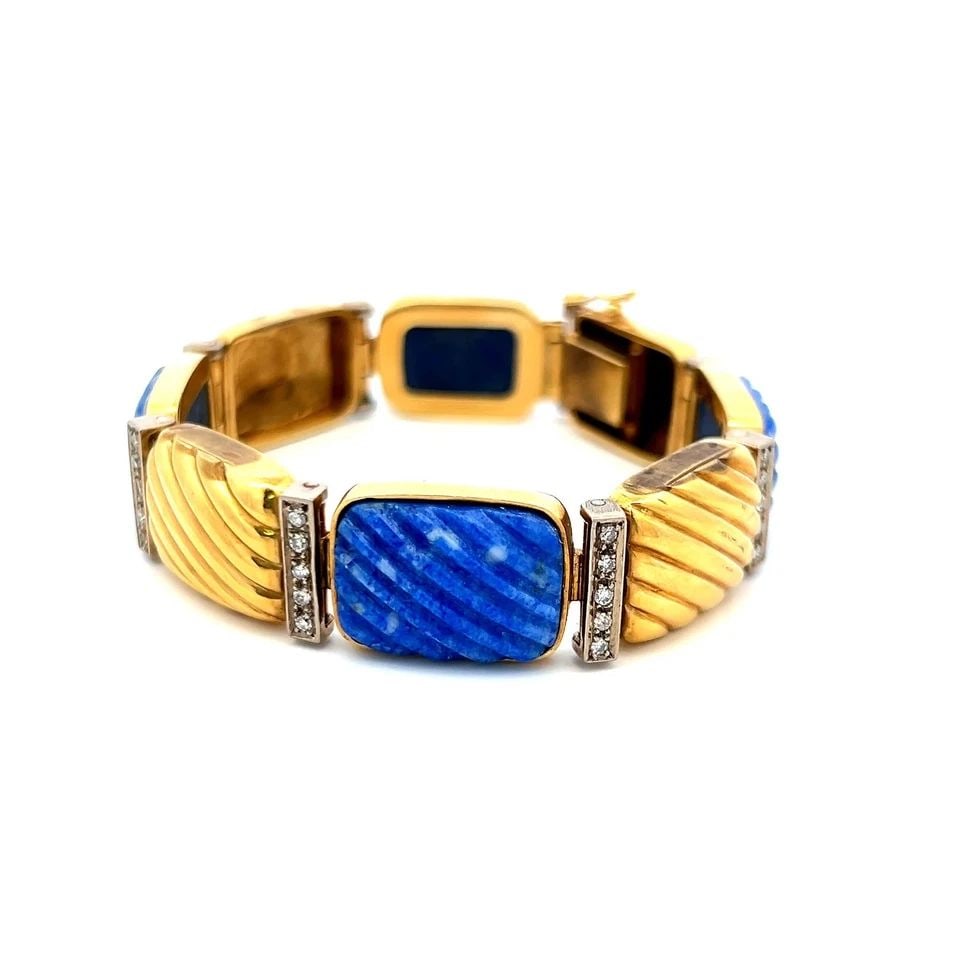 0.88 CARAT ROUND BRILLIANT DIAMOND LAPIS LAZULI 18K YELLOW GOLD LINK BRACELET: 0.88 CARAT ROUND BRILLIANT DIAMOND LAPIS LAZULI 18K YELLOW GOLD LINK BRACELET PRODUCT DESCRIPTION Title: 0.88 Carat Round Brilliant H SI Diamond 18 Karat Yellow Gold Link Bracelet Style: Link Metal: 1