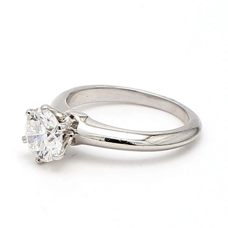 TIFFANY & CO.. 1.11 CARAT G-VS1 DIAMOND PLATINUM ENGAGEMENT RING: TIFFANY & CO.. 1.11 CARAT G-VS1 DIAMOND PLATINUM ENGAGEMENT RING Title: Tiffany and Co 1.11 Carat Round Brilliant Shape G-VS1 Diamond Platinum Engagement Ring Style: Engagement Metal: Platinum Gemston