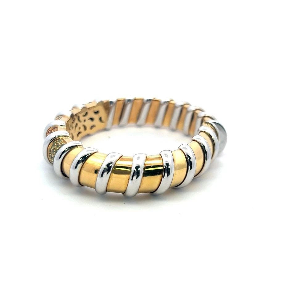 ROBERTO COIN 8.50 CARAT ROUND BRILLIANT DIAMOND 18K TWO TONE GOLD CUFF BRACELET: ROBERTO COIN 8.50 CARAT ROUND BRILLIANT DIAMOND 18K TWO TONE GOLD CUFF BRACELET Title: Roberto Coin 8.50 Carat Round Brilliant Diamond 18 Karat Two Tone Gold Cuff Bracelet Style: Cuff Metal: 18 Karat 