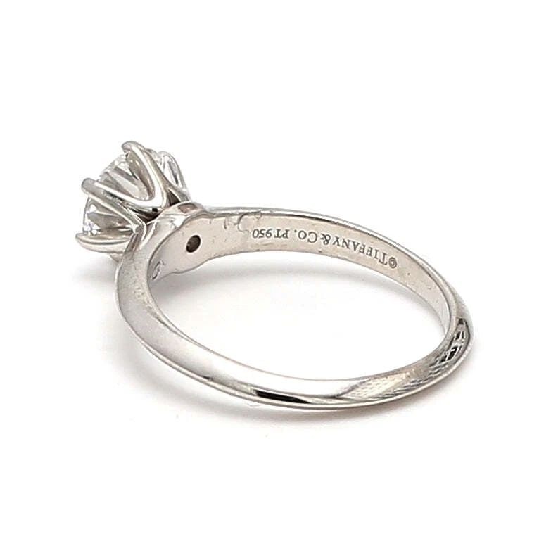 TIFFANY & CO.. 0.96 CARAT E-VS1 DIAMOND PLATINUM ENGAGEMENT RING: TIFFANY & CO.. 0.96 CARAT E-VS1 DIAMOND PLATINUM ENGAGEMENT RING Title: Tiffany and Co 0.96 Carat Round Brilliant Shape E-VS1 Diamond Platinum Engagement Ring Style: Engagement Metal: Platinum Gemston