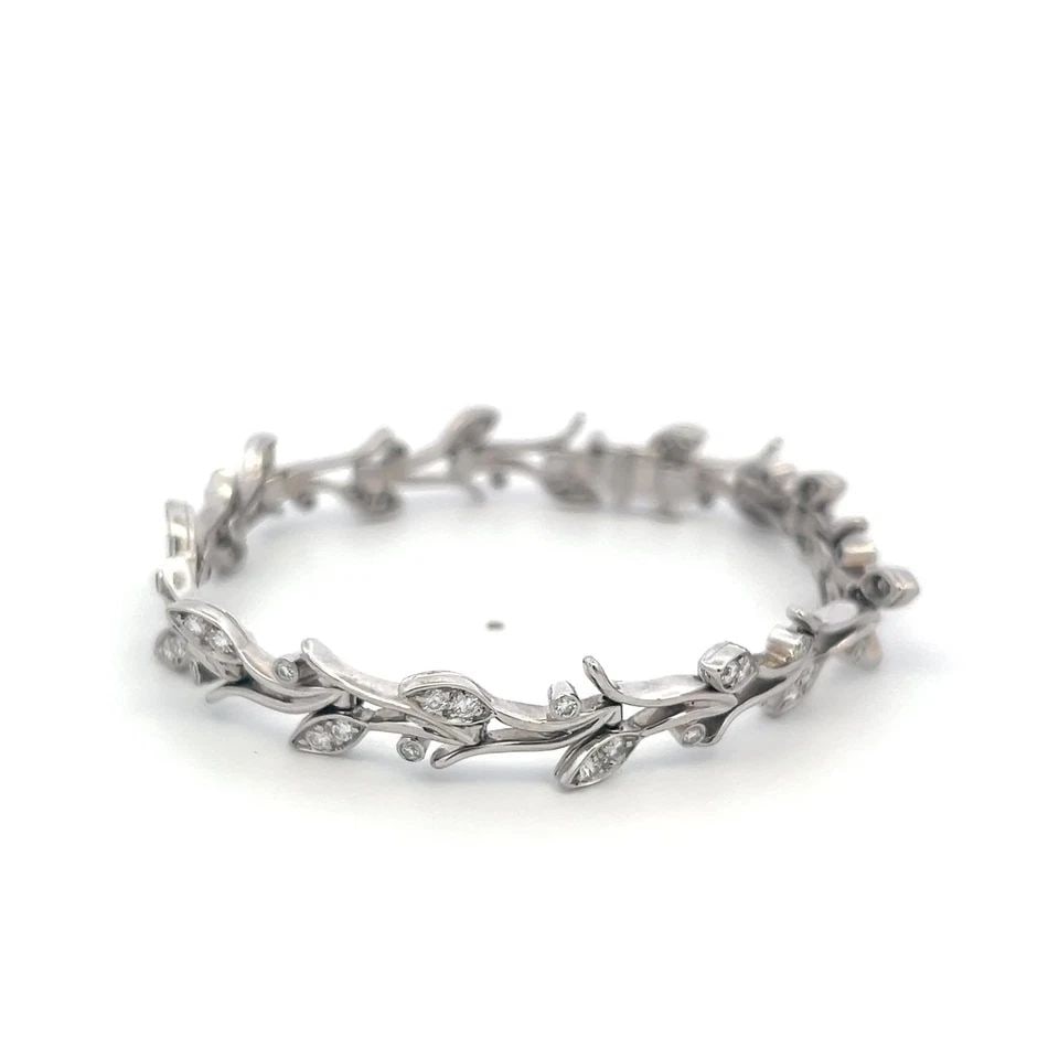 TIFFANY & CO PLATINUM LINK BRACELET WITH 1.35 CARAT ROUND F VS DIAMONDS: TIFFANY & CO PLATINUM LINK BRACELET WITH 1.35 CARAT ROUND F VS DIAMONDS TIFFANY & CO PLATINUM LINK BRACELET WITH 1.35 CARAT ROUND F VS DIAMONDS PRODUCT DESCRIPTION Designer: Tiffany & Co Detailed Desc