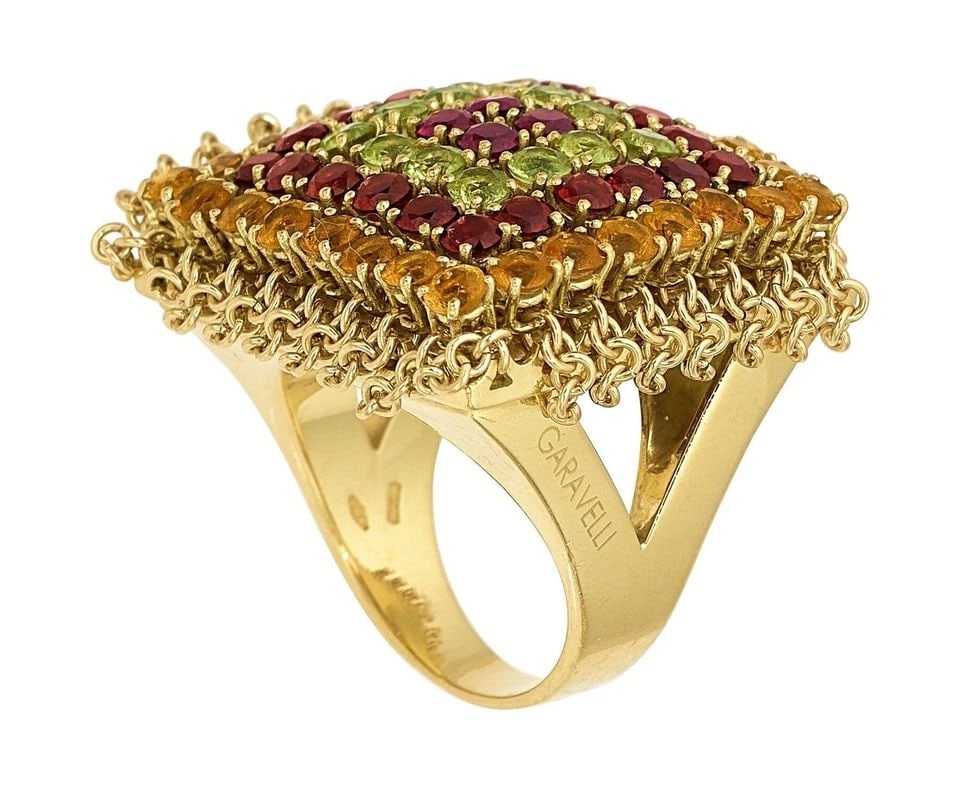 GARAVELLI 2.80 CARAT CITRINE 2.00 CARAT GARNET 1.20 CARAT PERIDOT 18K YG COCKTAI: GARAVELLI 2.80 CARAT CITRINE 2.00 CARAT GARNET 1.20 CARAT PERIDOT 18K YG COCKTAI GARAVELLI 2.80 CARAT CITRINE 2.00 CARAT GARNET 1.20 CARAT PERIDOT 18K YG COCKTAI $5,280.00 PRODUCT DESCRIPTION Designer