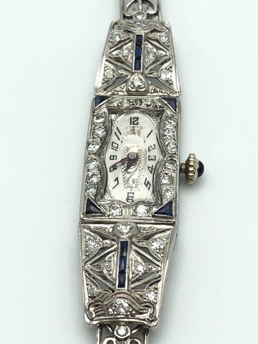 VINTAGE WOMAN'S WATCH WITH PLATINUM CASE, 14K BAND, DIAMONDS AND BLUE SAPPHIRE (1 of 1)