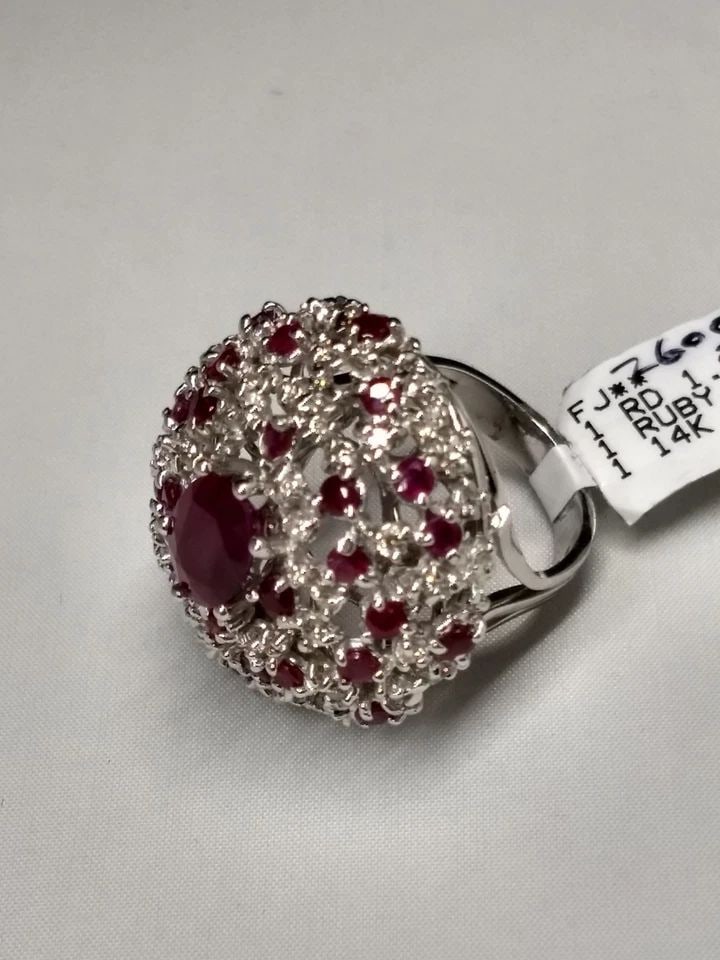 14K WHITE GOLD RING, 5.45CTS RUBIES, 1.95CTS DIAMONDS ( SIZE: 6.5 ) 13.3G: 14K WHITE GOLD NATURAL RUBY AND DIAMOND CLUSTER RING 14k White Gold natural Ruby and Diamond Cluster Ring You are bidding on a 14k white gold ring with natural (not synthetic) rubies and diamonds. The
