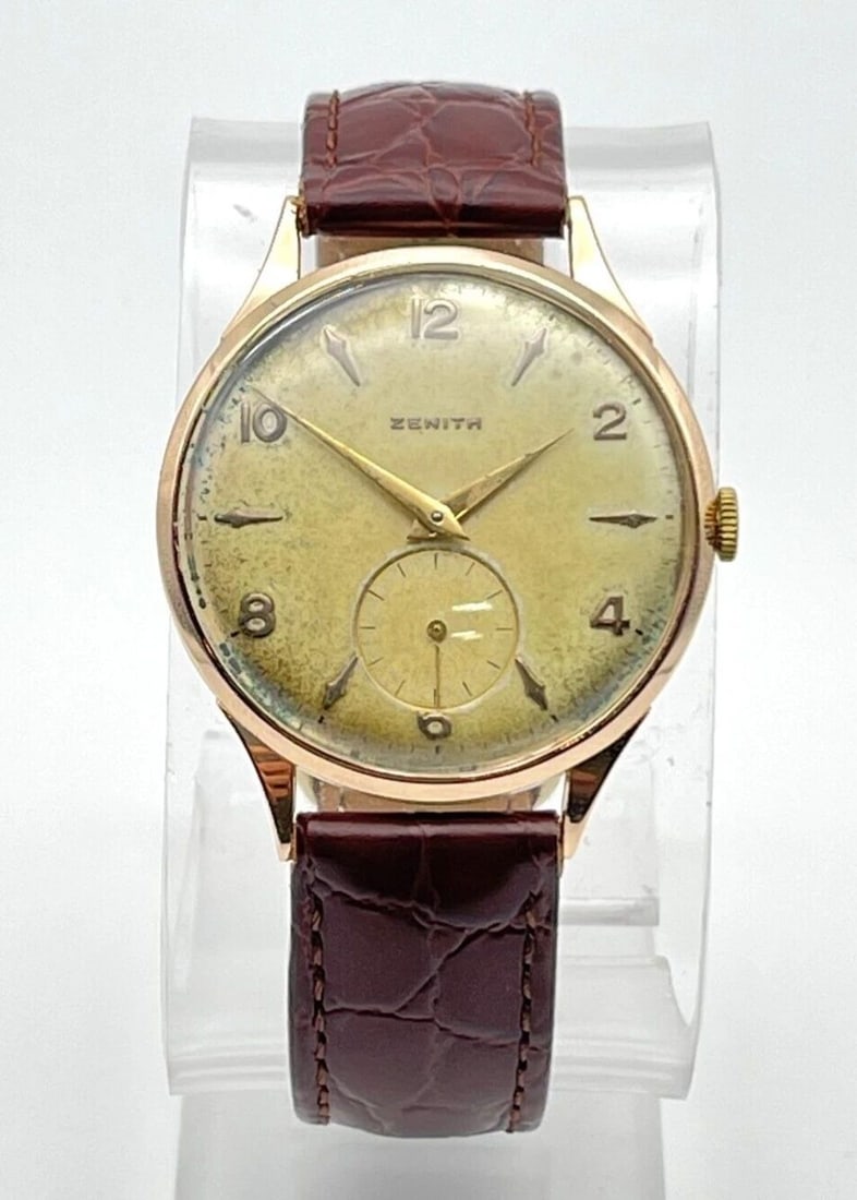 VINTAGE ZENITH 18K ROSE GOLD WATCH WITH LEATHER BAND AGED DIAL: VINTAGE ZENITH 18K ROSE GOLD WATCH WITH LEATHER BAND AGED DIAL Vintage Zenith 18k Rose Gold Watch with Leather Band Aged Dial You are bidding on a Vintage Zenith 18k Rose Gold Watch with Leather Band 