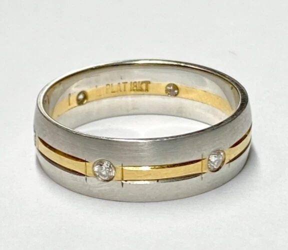 950 PLATINUM & 18K GOLD ETERNITY BAND WITH 0.25CTS DIAMONDS ( SIZE 10.5 ) 10.3G: MEN'S 18K YELLOW GOLD AND PLATINUM ETERNITY BAND W 0.25CT DIAMONDS (SIZE 10.5) Men's 18k Yellow Gold and Platinum Eternity Band with 0.25CT Diamonds (Size 10.5) You are bidding on a pre-owned Men's 18