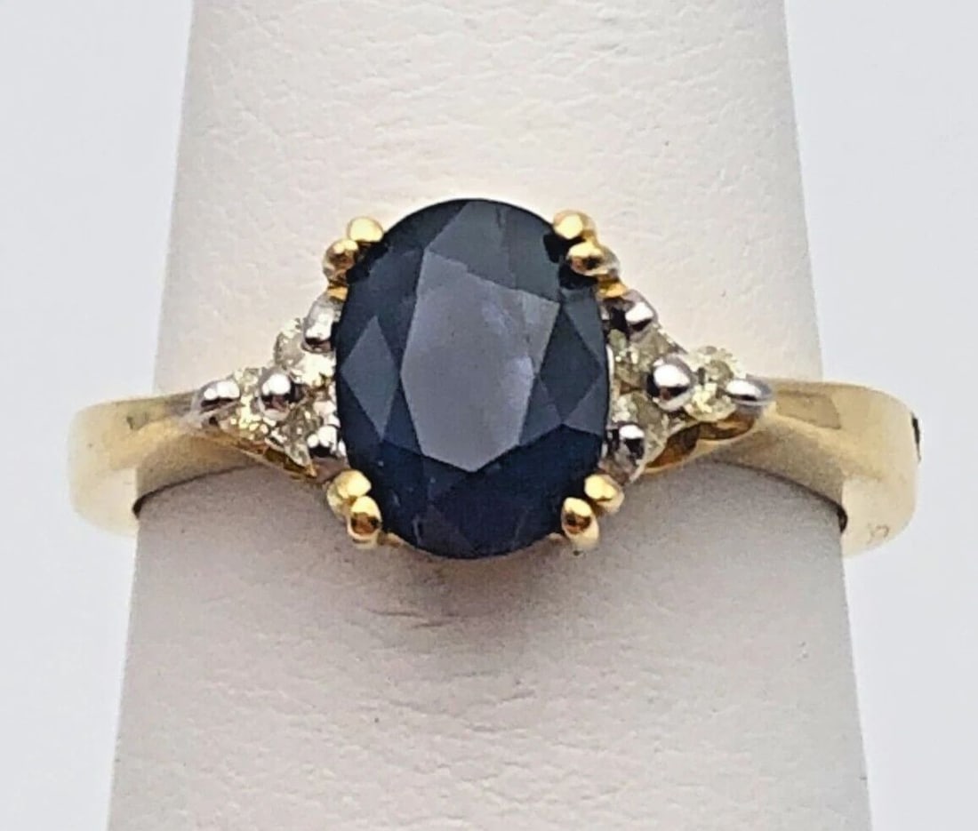 14K GOLD RING, 1.56CTS OF SAPPHIRES, 0.15CTS OF DIAMONDS ( SIZE: 6.5 ) 4G: 14K GOLD RING WITH CENTER NATURAL SAPPHIRE AND 0.15CTS OF DIAMONDS SIZE: 6.5 14k Gold Ring set with center Sapphire and 0.15cts of Diamonds Condition: New with original tag, has been moved around in i