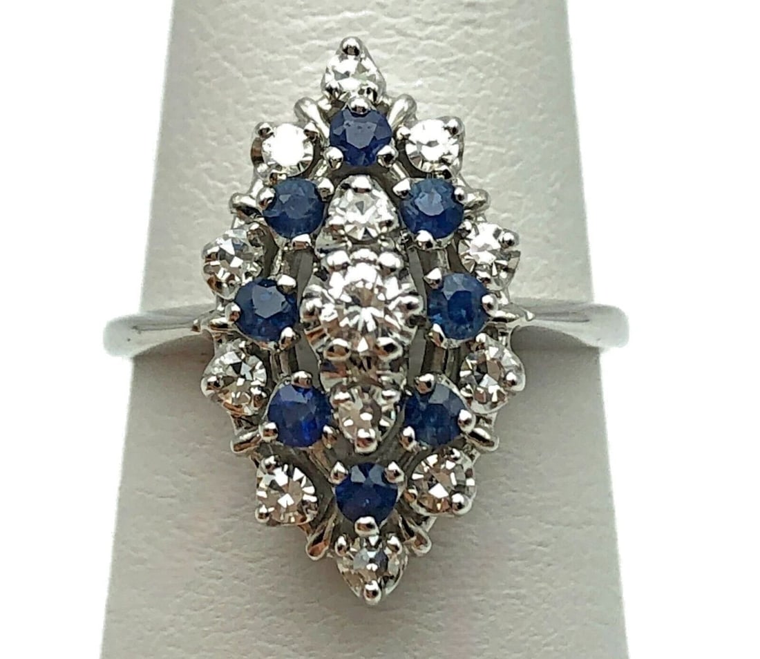 14K WHITE GOLD RING, 0.43CTS OF DIAMONDS, 0.24CTS OF SAPPHIRES SIZE: 6.5 4.1G: 14K WHITE GOLD RING WITH 0.43CTS OF DIAMONDS AND 0.24CTS OF SAPPHIRES SIZE: 6.5 14k White Gold Ring with 0.43cts of Diamonds and 0.24cts of Sapphires Condition: Lightly Used, has been cleaned Material