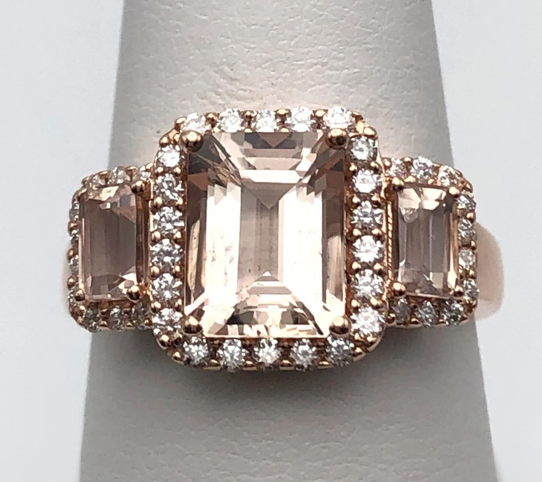 14K ROSE GOLD RING SET WITH 3 MORGANITES AND 0.50CTS DIAMONDS SIZE: 8.25: 14K ROSE GOLD RING SET WITH 3 MORGANITES AND 0.50CTS OF DIAMONDS SIZE: 8.25 14k Rose Gold Ring set with 3 Morganites and 0.50cts of Diamonds Condition: Display model, has been moved around in inventor