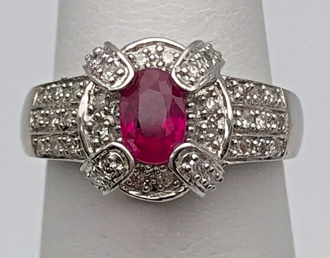 14K WHITE GOLD RING WITH 0.60CTS NATURAL RUBY, 0.38CTS DIAMONDS (SIZE: 5) 3.7G: 14K WHITE GOLD RING SET WITH NATURAL RUBY AND 0.38CTS OF DIAMONDS SIZE: 5 14k White Gold Ring set with center Ruby and 0.38cts of Diamonds Condition: Used, has been cleaned Material: 14k White Gold Ri