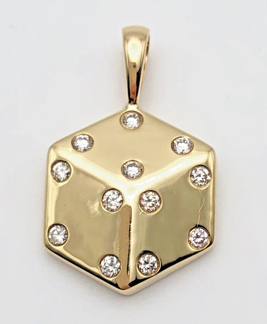 10K YELLOW GOLD DICE PENDANT WITH 0.25CTS OF DIAMONDS 6.3G: 10K YELLOW GOLD DIE PENDANT WITH 0.25CTS DIAMONDS 10k Yellow Gold Die Pendant with 0.25cts Diamonds You are bidding on a 10k Yellow Gold Die Pendant with 0.25cts Diamonds. The piece has been fully che