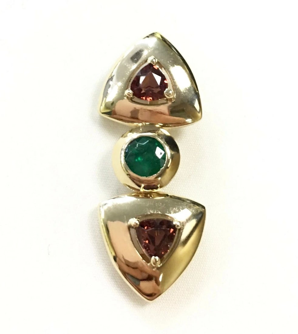 14K YELLOW GOLD PENDANT WITH EMERALD AND TWO GARNETS 5.5G: 14K YELLOW GOLD PENDANT WITH EMERALD AND GARNETS 14k Yellow Gold Pendant with Emerald and Garnets You are bidding on a 14k Yellow Gold Pendant with Emerald and Garnets. The piece has been fully restor
