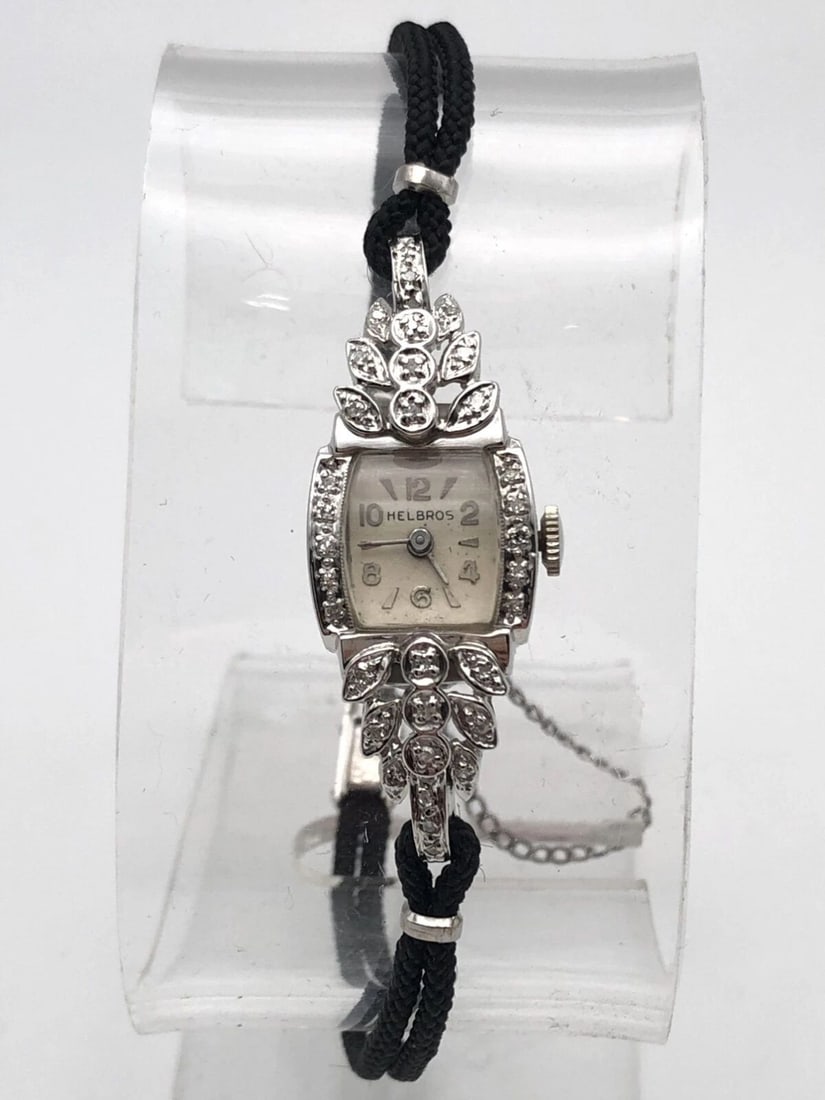 VINTAGE LADIES 14K WHITE GOLD, HELBROS WATCH WITH 0.25CTS OF DIAMONDS: Vintage Ladies 14k White Gold, Helbros Watch with 0.25cts of Diamonds Condition: Vintage Used Material: Case and back are solid 14k White Gold (NOT plated/filled). Contains 6.0 grams of 14kt white gol