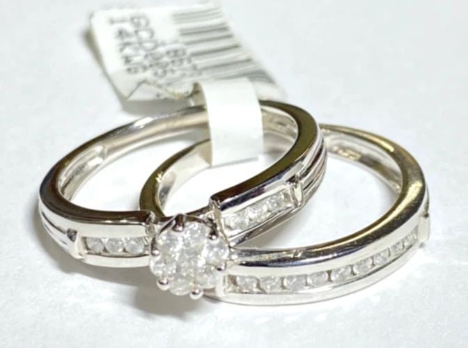 NEW 14K WHITE GOLD WEDDING RING SET WITH 0.33CTW DIAMONDS (SIZE 6.75) 5.2 GRAM: WOMEN'S 14K WHITE GOLD WEDDING RING SET WITH 0.33CT DIAMONDS (SIZE 6.75) Women's 14k White Gold Wedding Ring Set with 0.33CT Diamonds (Size 6.75) You are bidding on a new with tags Women's 14k White G