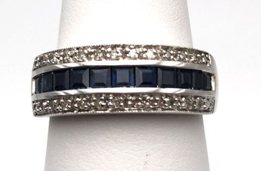 NEW 10K WHITE GOLD BAND WITH SAPPHIRES AND DIAMONDS (SIZE 7) 3.9 GRAM: 10K WHITE GOLD BAND WITH SAPPHIRES AND 0.10 CARATS OF DIAMONDS SIZE: 7 10k White Gold Band with Sapphires and 0.10 carats of Diamonds You are bidding on a 10k White Gold Band with Sapphires and 0.10 c