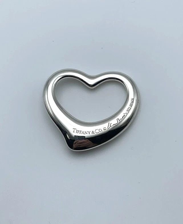 TIFFANY & CO. ELSA PERETTI LARGE OPEN HEART PENDANT 925 STERLING SILVER 35X33MM: TIFFANY & CO. ELSA PERETTI LARGE OPEN HEART PENDANT 925 STERLING SILVER 35X33MM Tiffany & Co. Elsa Peretti Large Open Heart Pendant 925 Sterling Silver You are bidding on a Tiffany & Co. Elsa Peretti 