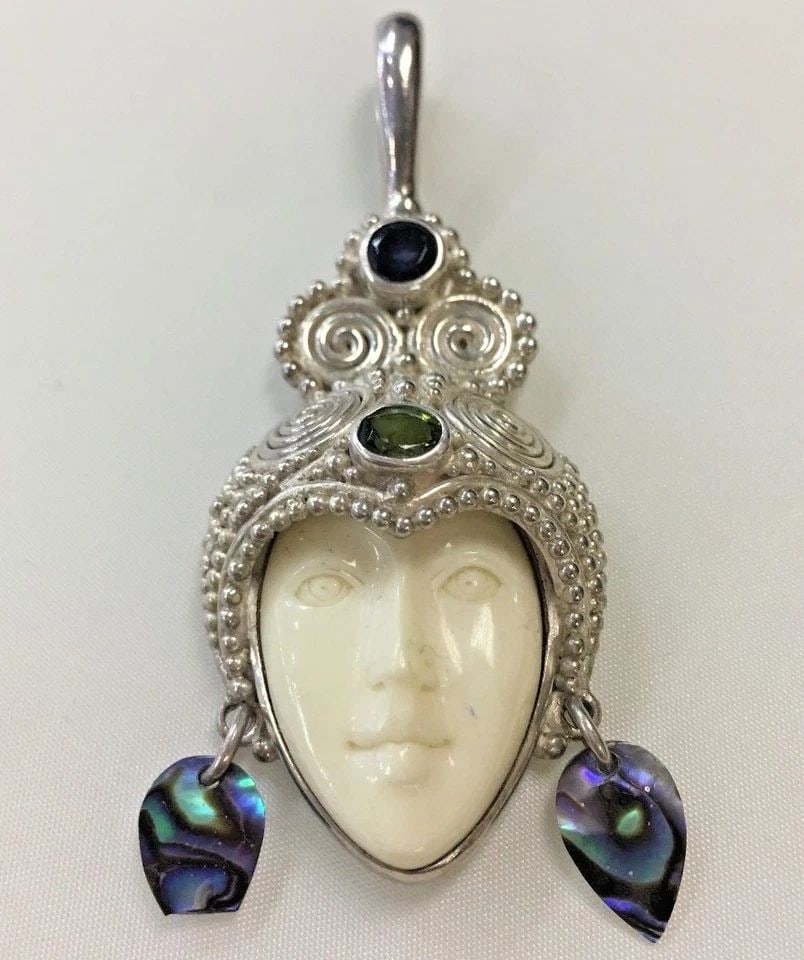 SAJEN STERLING SILVER FACE PENDANT WITH TINY SHELLS (1 of 1)