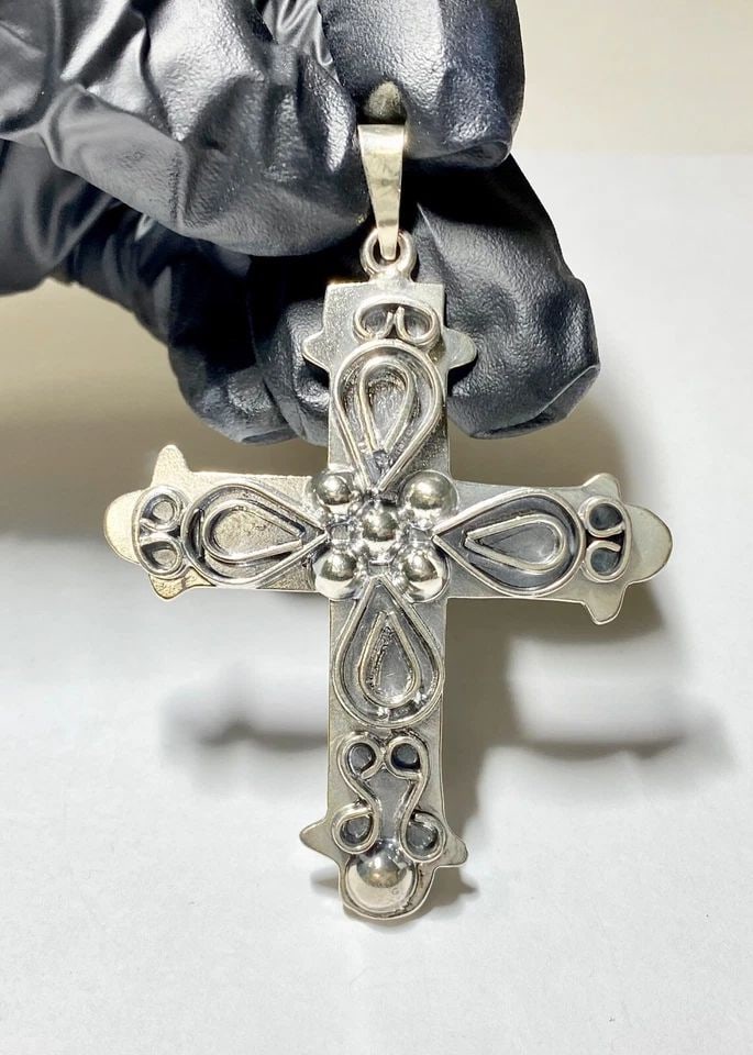 925 SILVER CROSS PENDANT 3"LX 2"W 23 GRAMS: 925 SILVER CROSS PENDANT 3"LX 2"W 925 Silver Cross Pendant 3"Lx 2"W You are bidding on a pre-owned 925 Silver Cross Pendant. The pendant has scuffs and scratches from normal wear and tear, but overall