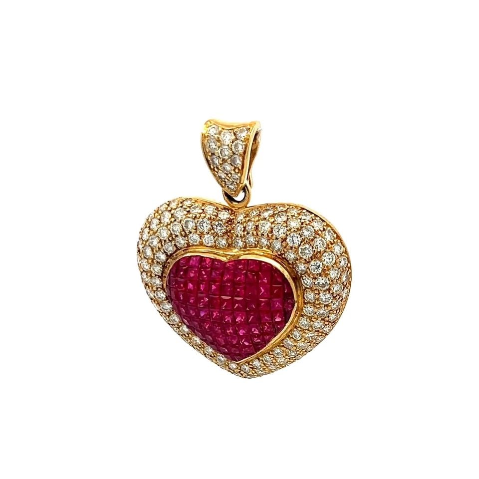 18K YG HEART PENDANT WITH 3.75 CARAT ROUND F-VS DIAMONDS & 2.6 CARAT RUBY: 18K YG HEART PENDANT WITH 3.75 CARAT ROUND F-VS DIAMONDS & 2.6 CARAT RUBY Video: Video Link Detailed Description: A timeless symbol of love and elegance, this vintage heart-shaped pendant in 18 karat 