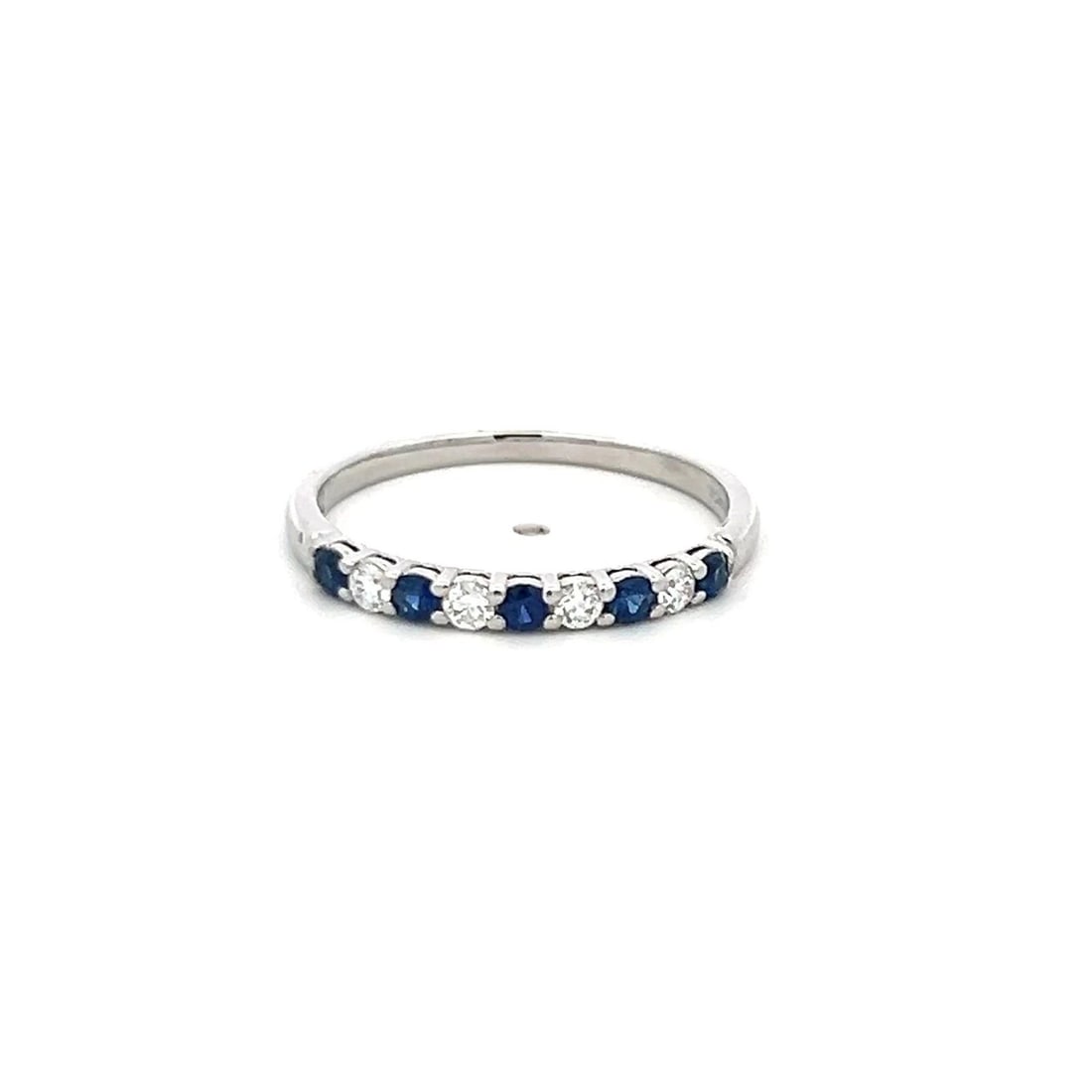TIFFANY & CO PLATINUM HALF-ETERNITY RING WITH SAPPHIRE & DIAMOND (0.12CT FVS): TIFFANY & CO PLATINUM HALF-ETERNITY RING WITH SAPPHIRE & DIAMOND (0.12CT FVS) PRODUCT DESCRIPTION Designer: Tiffany & Co Title: Tiffany & Co 0.15 Carat Round Brilliant Sapphire 0.12 Carat Round Brilli