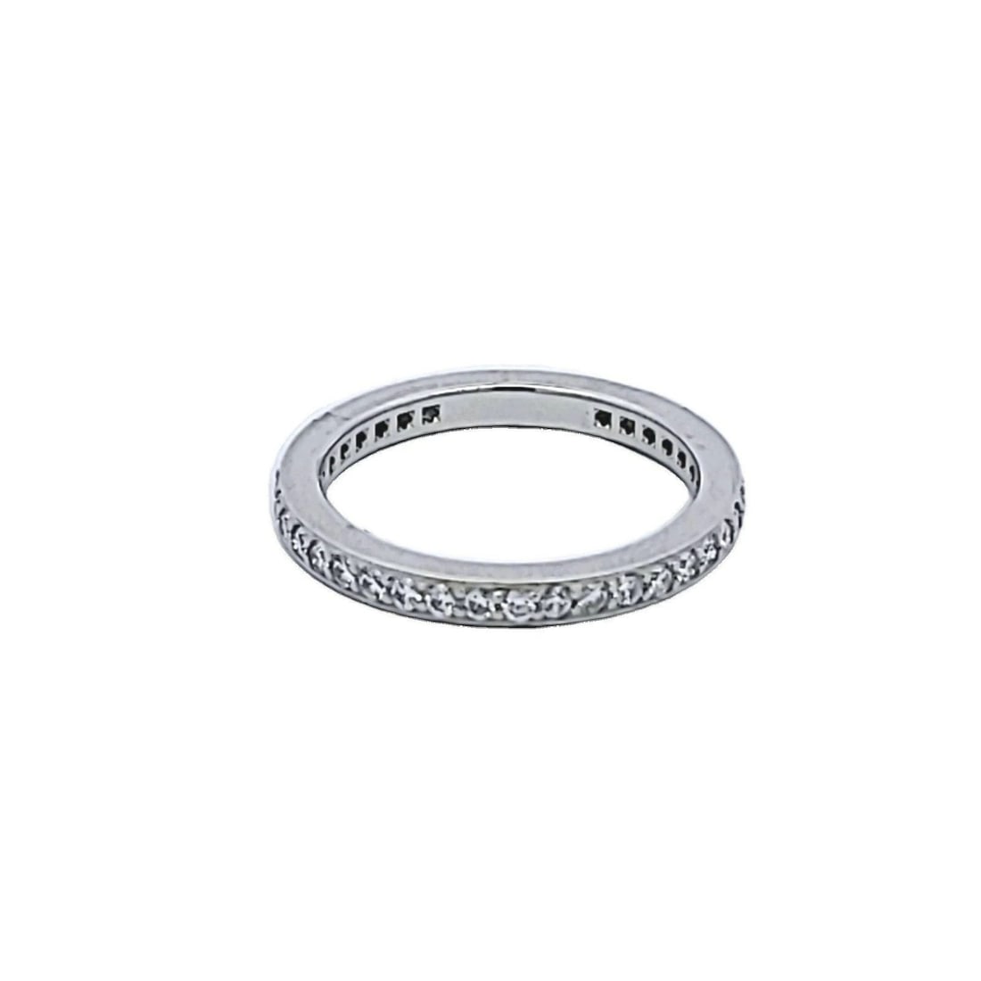 TIFFANY & CO 0.25 CARAT ROUND BRILLIANT F VS1 DIAMOND PLATINUM BAND RING: TIFFANY & CO 0.25 CARAT ROUND BRILLIANT F VS1 DIAMOND PLATINUM BAND RING Designer: Tiffany & Co Title: Tiffany & Co 0.25 Carat Round Brilliant F VS1 Diamond Platinum Band Ring Style: Band Metal: Plati