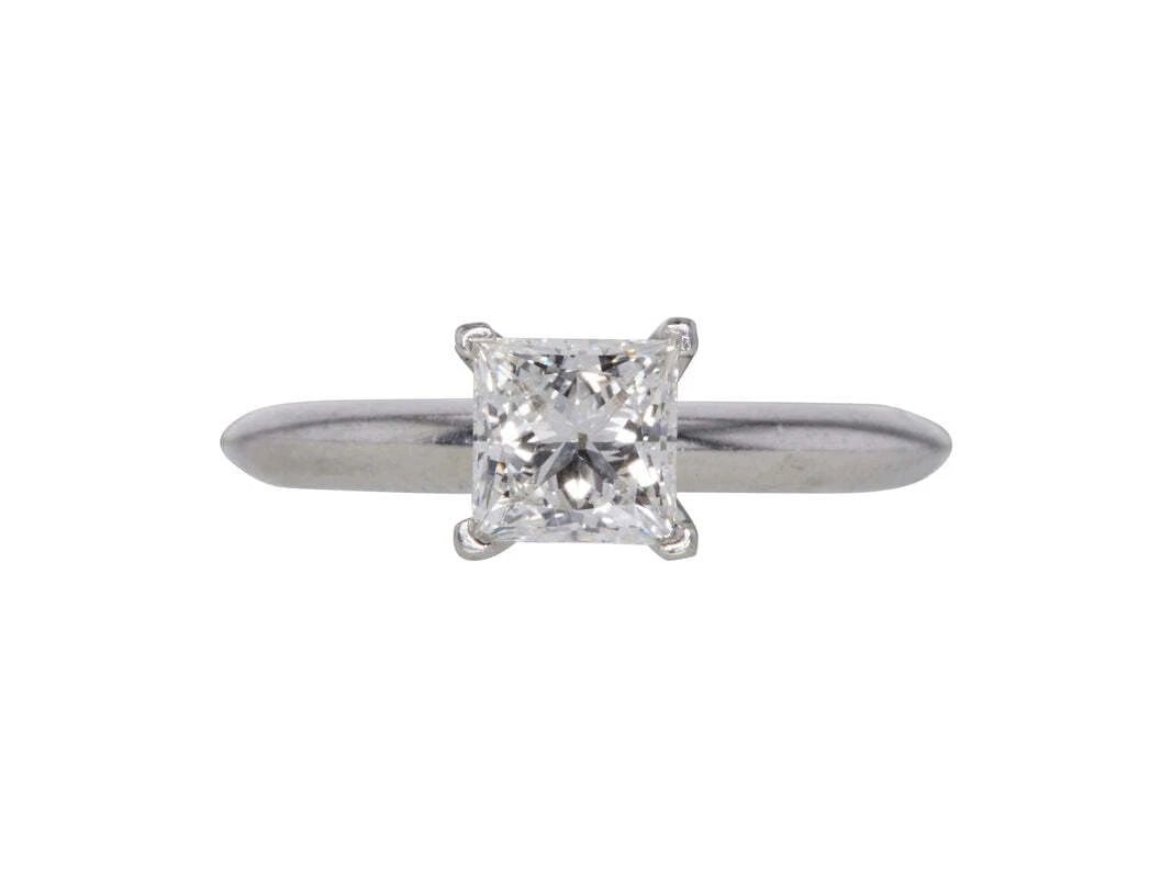 TIFFANY & CO.. 0.64 CARAT PRINCESS CUT F-VVS1 DIAMOND PLATINUM ENGAGEMENT RING: TIFFANY & CO.. 0.64 CARAT PRINCESS CUT F-VVS1 DIAMOND PLATINUM ENGAGEMENT RING Tiffany & Co. Tiffany & Co.. 0.64 Carat Princess Cut F-VVS1 Diamond Platinum Engagement Ring Details Department Unisex Ad