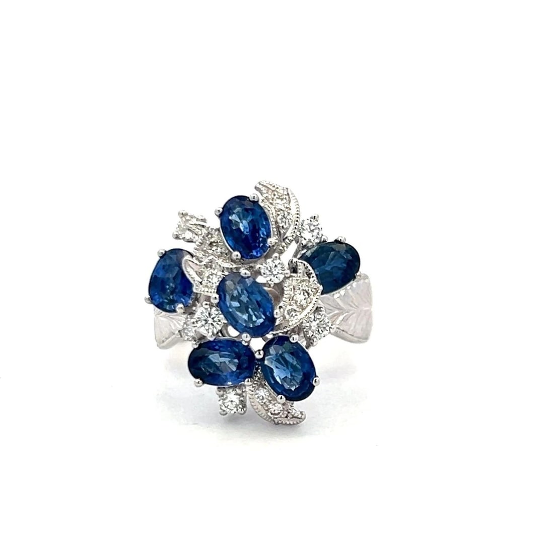 3.23 CARAT SAPPHIRE 0.40 CARAT ROUND DIAMOND 18 KARAT WHITE GOLD COCKTAIL RING: 3.23 CARAT SAPPHIRE 0.40 CARAT ROUND DIAMOND 18 KARAT WHITE GOLD COCKTAIL RING PRODUCT DESCRIPTION Title: 3.23 Carat Oval Shape Sapphire 0.40 Carat Round Brilliant Diamond 18 Karat White Gold Cocktail