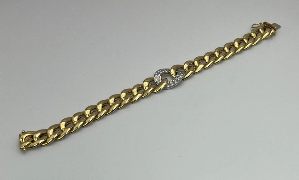 18K YELLOW GOLD AND DIAMOND LARGE LINK BRACELET: 18K YELLOW GOLD AND DIAMOND LARGE LINK BRACELET 18K YELLOW GOLD AND DIAMOND LARGE LINK BRACELET 18K Yellow Gold with Diamonds Large Link BraceletApproximate weight is 27.9 g32 round diamonds = 0.76 ct