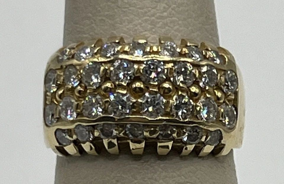 14KT YELLOW GOLD & DIAMOND THICK RING SIZE 6: 14KT YELLOW GOLD & DIAMOND THICK RING SIZE 6 14KT YELLOW GOLD & DIAMOND THICK RING SIZE 6 This stunning thick ring is a must-have for any jewelry collection. Crafted from 14k yellow gold, this ring is