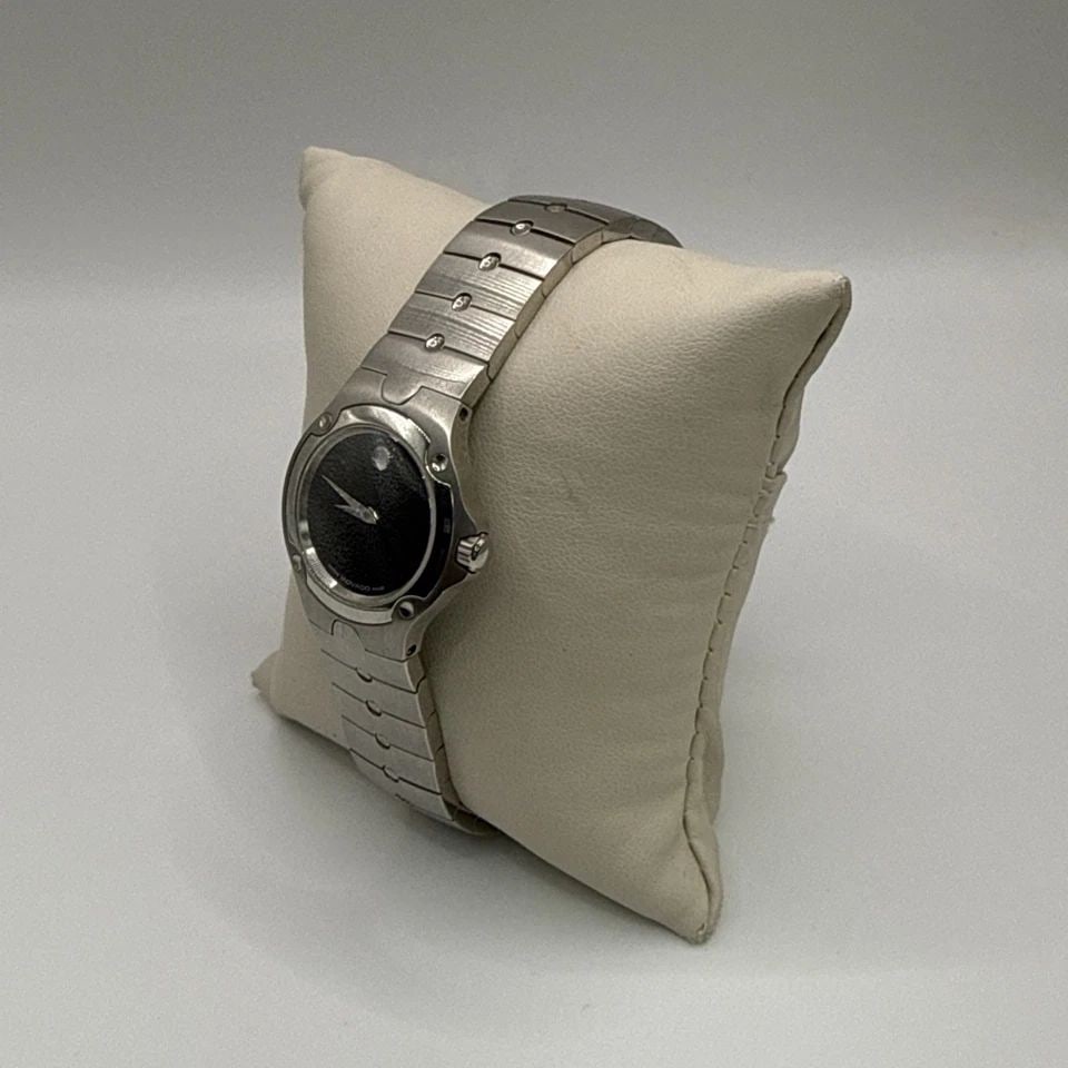 LADIES MOVADO MUSEUM SPORTS EDITION WATCH The Ladies Movado Museum Sports Edition Watch is a stylish: The Ladies Movado Museum Sports Edition Watch is a stylish wristwatch designed for women. Made with stainless steel band material and a black dial color, this Swiss-made timepiece features the iconic 