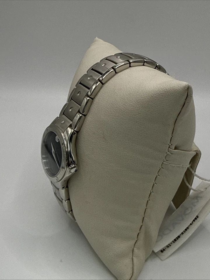 LADIES SMALL FACE MOVADO MUSEUM SPORTS EDITION WATCH The Ladies Small Face Movado Museum Sports: The Ladies Small Face Movado Museum Sports Edition Watch is a stylish and versatile wristwatch designed specifically for women. Made with a stainless steel band and featuring a sleek black dial, this 