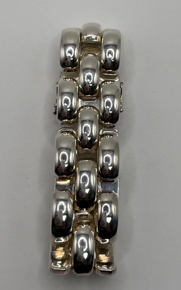 7.5" FANCY LINK BRACELET 55.3 GRAMS: 7.5" FANCY LINK BRACELET 55.3 GRAMS The 7.5" Fancy Link Bracelet is a stunning piece of fine jewelry made from 55.3 grams of sterling silver with a metal purity of 925. This stylish chain bracelet fea