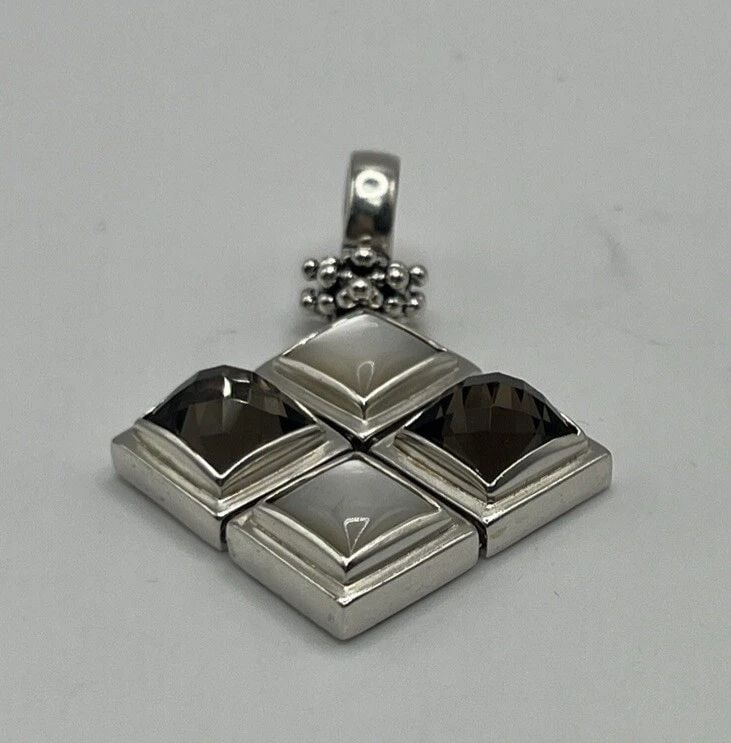 MICHAEL DAWKINS 925 STERLING SILVER MOP SMOKY QUARTZ PENDANT ENHANCER, L 1.75: MICHAEL DAWKINS 925 STERLING SILVER MOP SMOKY QUARTZ PENDANT ENHANCER, L 1.75” MICHAEL DAWKINS 925 STERLING SILVER MOP SMOKY QUARTZ PENDANT ENHANCER, L 1.75” Enhance your jewelry collectio
