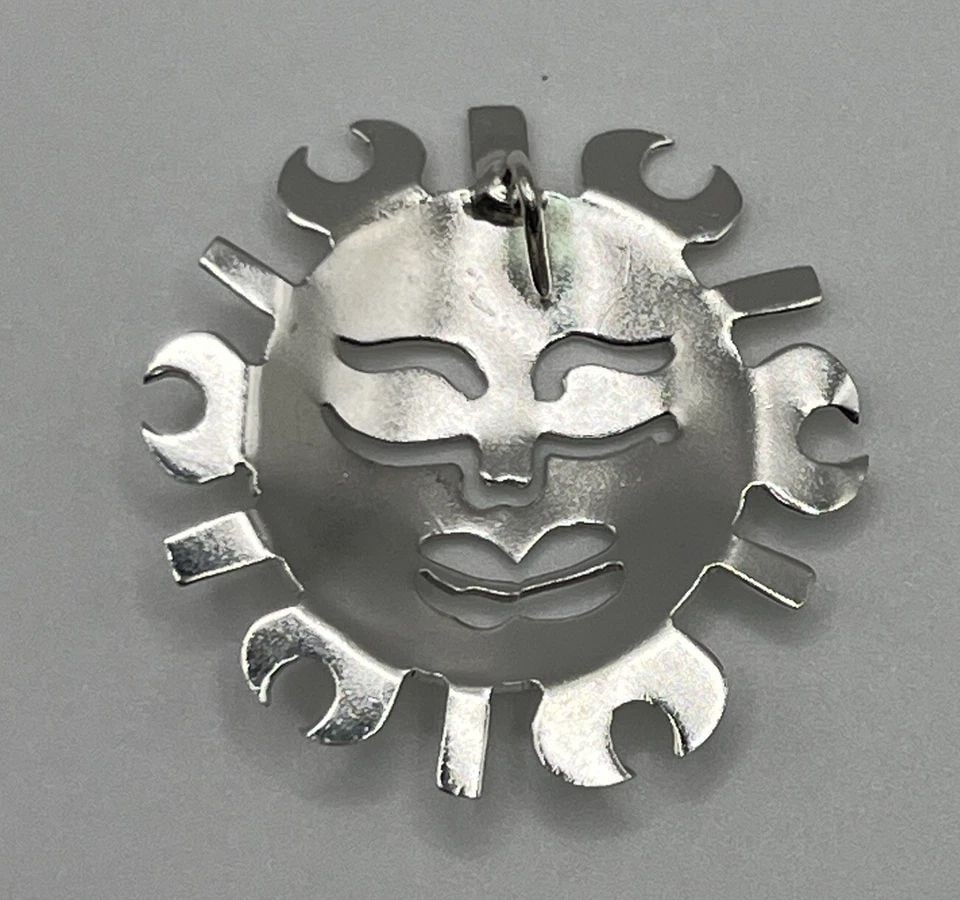 STERLING SILVER MEXICO SUN FACE PENDANT: STERLING SILVER MEXICO SUN FACE PENDANT STERLING SILVER MEXICO SUN FACE PENDANT Add some Mexican flair to your jewelry collection with this beautiful Sun Face Pendant. Crafted from high-quality 925 St