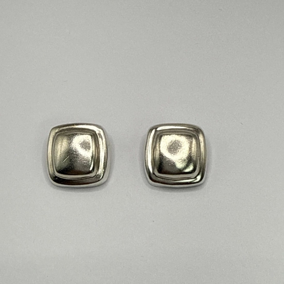STERLING SILVER CLIP-ON EARRINGS: Sterling Silver Clip-On Earrings These Sterling Silver Clip-On Earrings are a stylish and elegant choice for anyone looking to add a touch of sophistication to their outfit. Made from high-quality 925