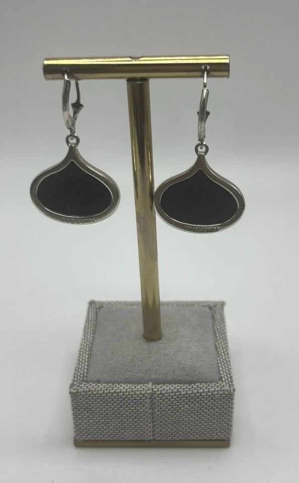 STERLING SILVER & TIGERS EYE EARRINGS: STERLING SILVER & TIGERS EYE EARRINGS STERLING SILVER & TIGERS EYE EARRINGS These stunning earrings are made of high-quality sterling silver and feature a beautiful tiger's eye stone in a deep purple/