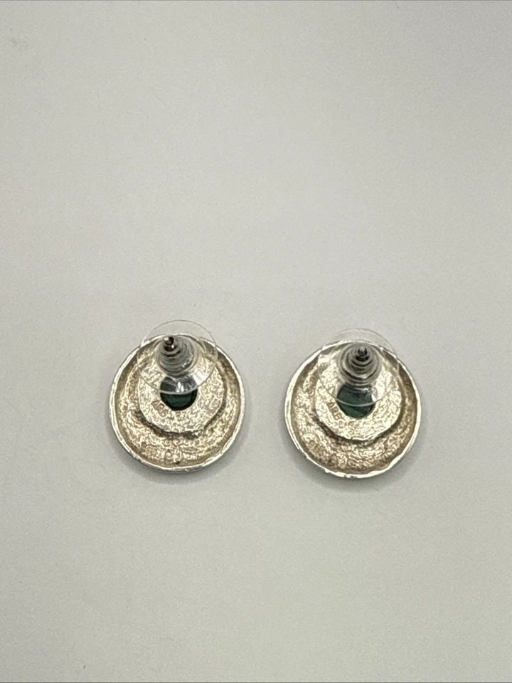 MALACHITE & STERLING SILVER EARRINGS 8.6 GRAMS: MALACHITE & STERLING SILVER EARRINGS 8.6 GRAMS These earrings feature malachite stones set in sterling silver, weighing 8.6 grams. The stud style earrings are perfect for special occasions like annive