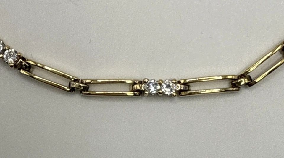 7.5" GOLD COLORED 925 BRACELET WITH COLORLESS STONES (1 of 1)