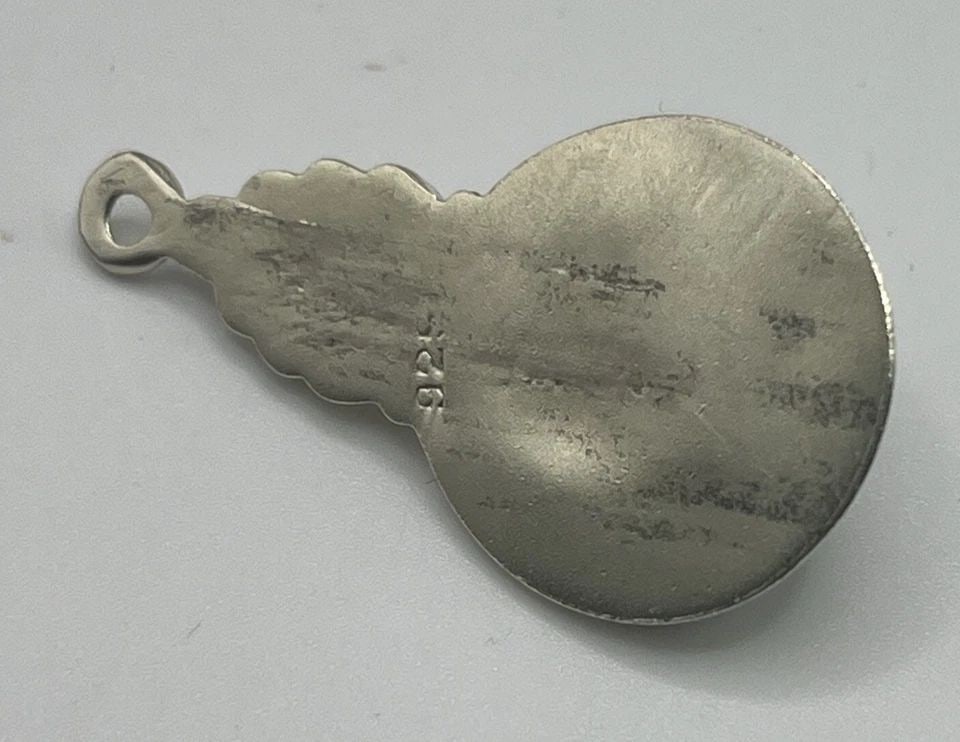STERLING SILVER PENDANT WITH TURQUOISE STONE 3.8 GRAMS: STERLING SILVER PENDANT WITH TURQUOISE STONE 3.8 GRAMS STERLING SILVER PENDANT WITH TURQUOISE STONE 3.8 GRAMS This beautiful pendant is a stunning piece of Native American jewelry. Made from 925 sterl
