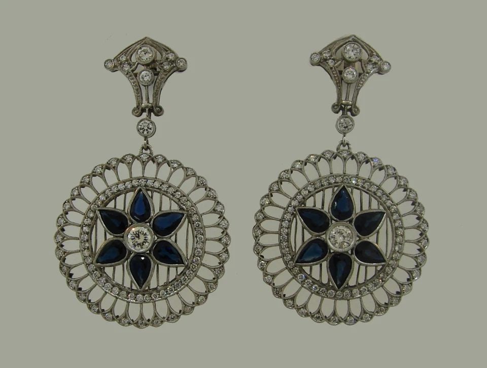 SAPPHIRE DIAMOND PLATINUM DANGLE EARRINGS ART DECO REVIVAL 1960S: SAPPHIRE DIAMOND PLATINUM DANGLE EARRINGS ART DECO REVIVAL 1960S Sapphire Diamond Platinum Earrings Wonderful earrings that are a great addition to your collection. Weight is 19.4 grams. Made of plati