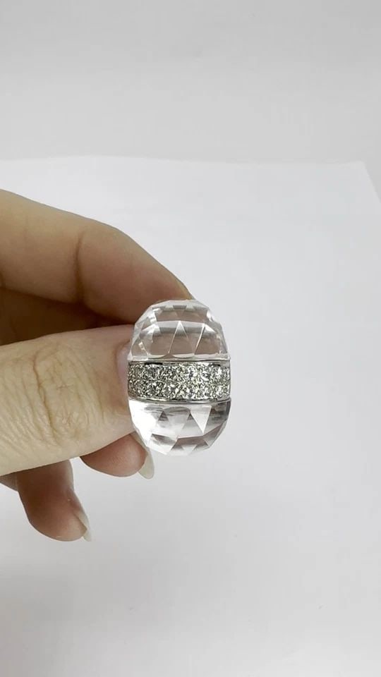 VINTAGE ITALIAN 18K WHITE GOLD DIAMOND ROCK CRYSTAL COCKTAIL RING: VINTAGE ITALIAN 18K WHITE GOLD DIAMOND ROCK CRYSTAL COCKTAIL RING KL UUOO This vintage Italian diamond and rock crystal ring is crafted in 18k gold and dates to the 1960s. The design features two larg