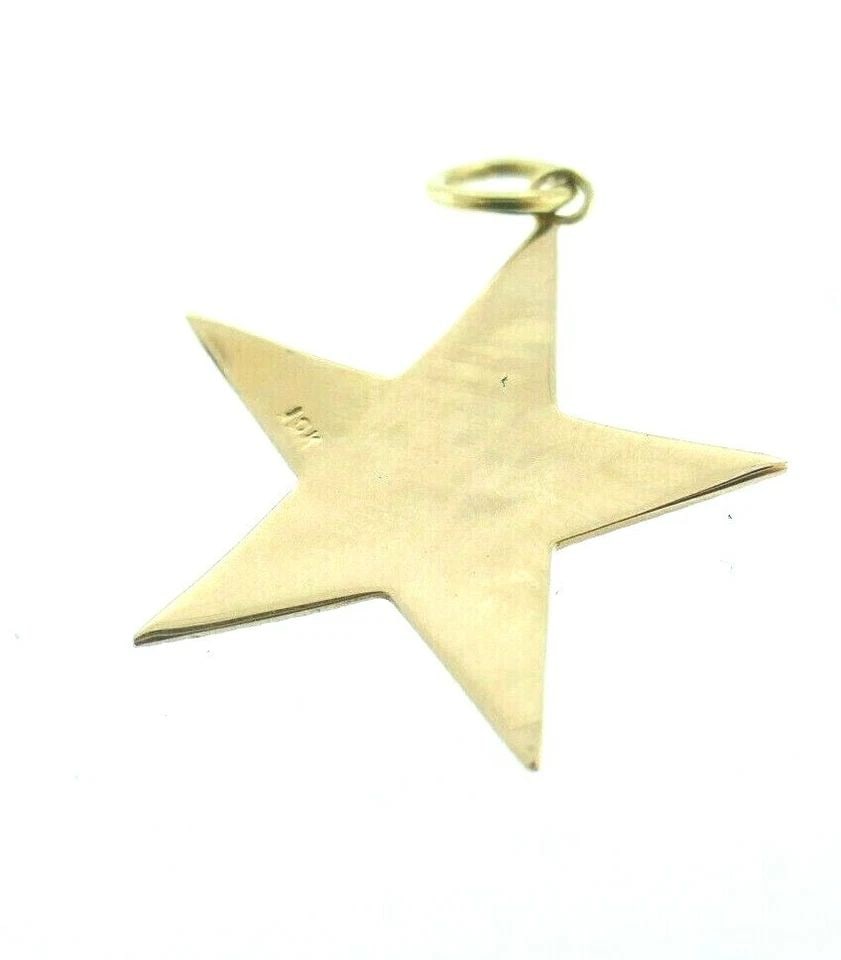 ANTIQUE 10K ROSE GOLD & ENAMEL STAR PENDANT CHARM CIRCA 1900S: ANTIQUE 10K ROSE GOLD & ENAMEL STAR PENDANT CHARM CIRCA 1900S Antique 10k Rose Gold & Enamel Star Pendant Circa 1900s This is a must for a collector. The weight is 2.14 grams. The length is 7/8 of an 