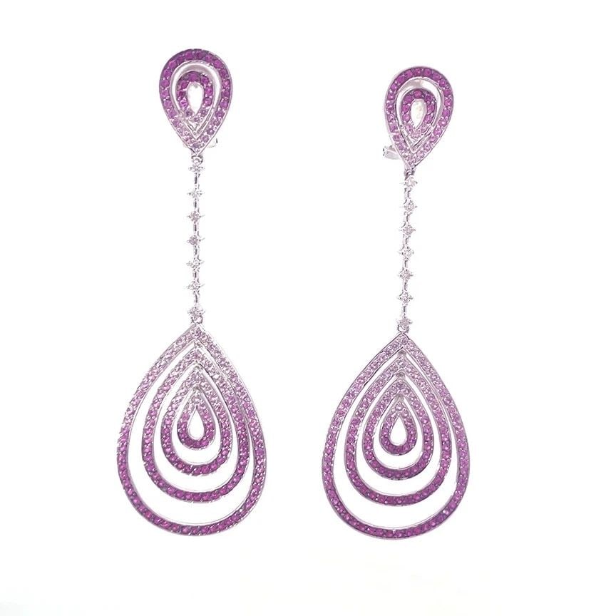 DIAMOND SAPPHIRE GOLD EARRINGS 18K LONG DANGLE TEARDROP STYLE: DIAMOND SAPPHIRE GOLD EARRINGS 18K LONG DANGLE TEARDROP STYLE These gorgeous long drop dangle earrings are crafted from 18k white gold featuring 2 row teardrop top with deep to light pink sapphires, b