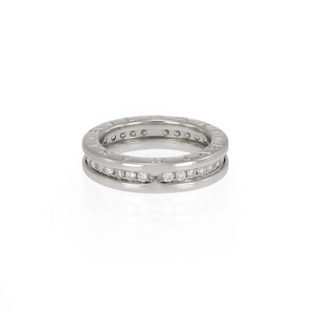 CARTIER RING DIAMOND PLATINUM FULL CIRCLE BEZEL SIZE 47 US 4 W/CERT: CARTIER RING DIAMOND PLATINUM FULL CIRCLE BEZEL SIZE 47 US 4 W/CERT The Cartier Ring is a stunning piece of fine jewelry featuring a full circle platinum bezel set with white oval-shaped diamonds. Thi