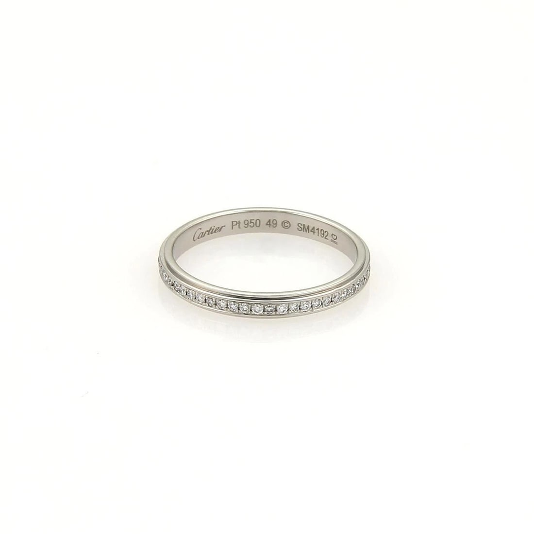 RING ART DECO DIAMOND GEMSTONE PLATINUM: RING ART DECO DIAMOND GEMSTONE PLATINUM This vintage Art Deco diamond ring features a prong setting style and is crafted in platinum, embodying the elegance and sophistication of the era. The ring sho