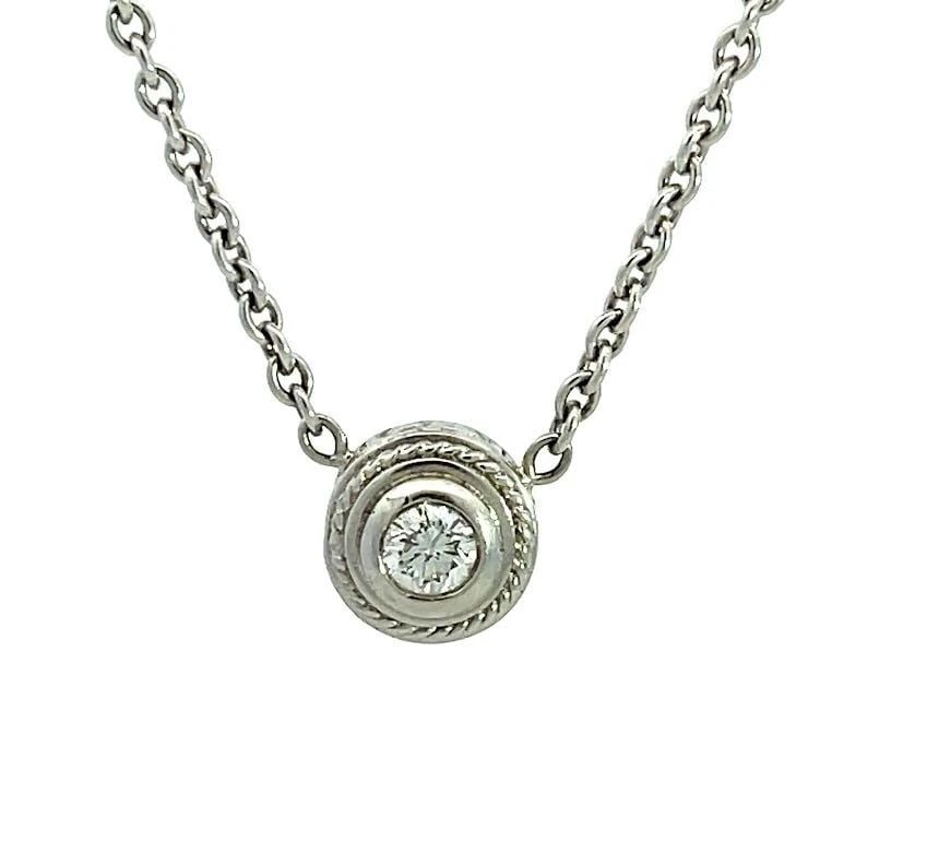 DIAMOND HEART PENDANT 14K WHITE GOLD DOME HAMMERED STYLE W/CHAIN.: DIAMOND HEART PENDANT 14K WHITE GOLD DOME HAMMERED STYLE W/CHAIN. This elegant pendant and chain are crafted from 14k white gold. The pendant is detachable with clip latch back bail. The front of the 