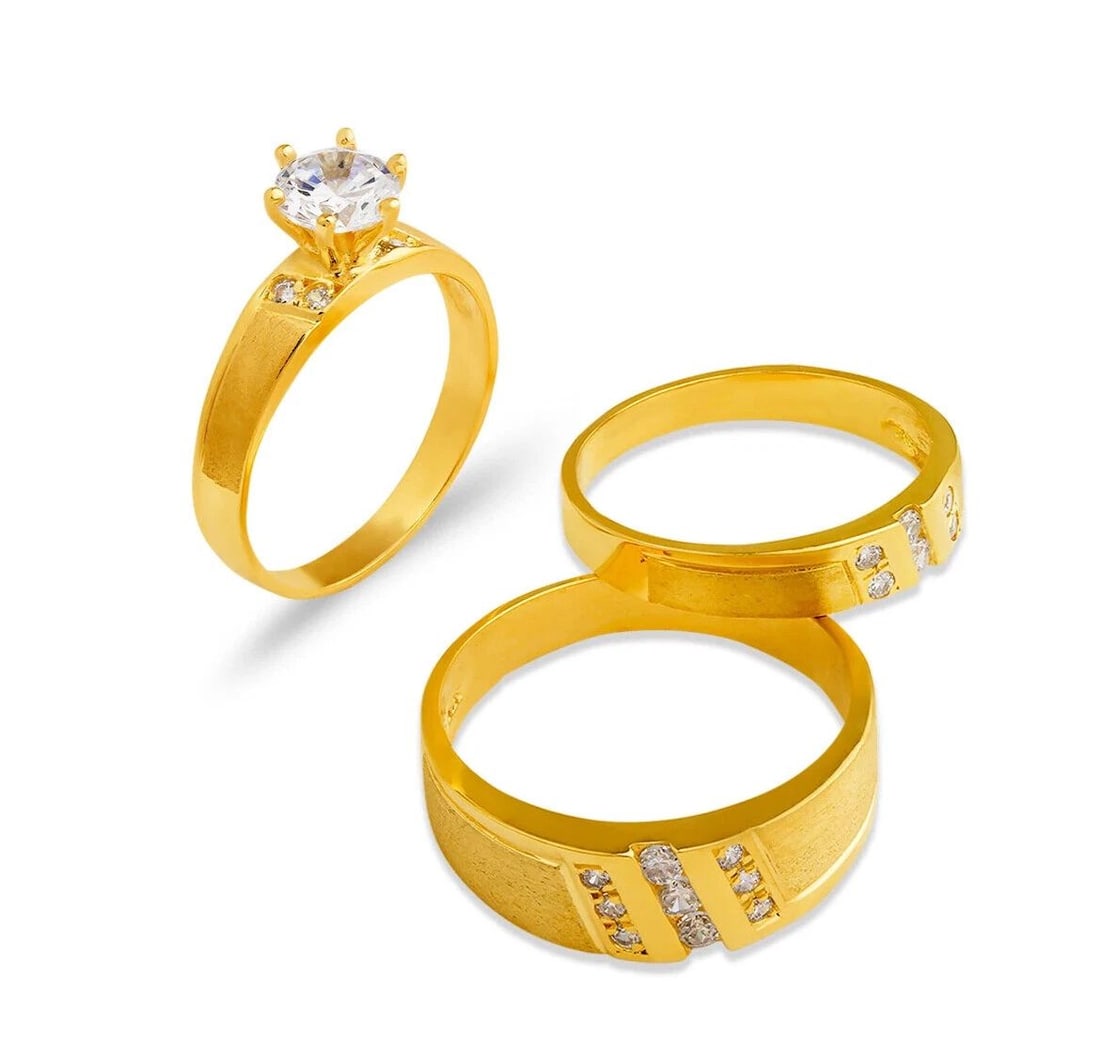 NEW 14K YELLOW GOLD WEDDING TRIO RING SET: NEW 14K YELLOW GOLD WEDDING TRIO RING SET 14K Yellow Gold Ladies band and engagement ring is size 7 Men's ring is size 10 Rings Also Sold Separately Available in White Gold Weight:7.7 Grams