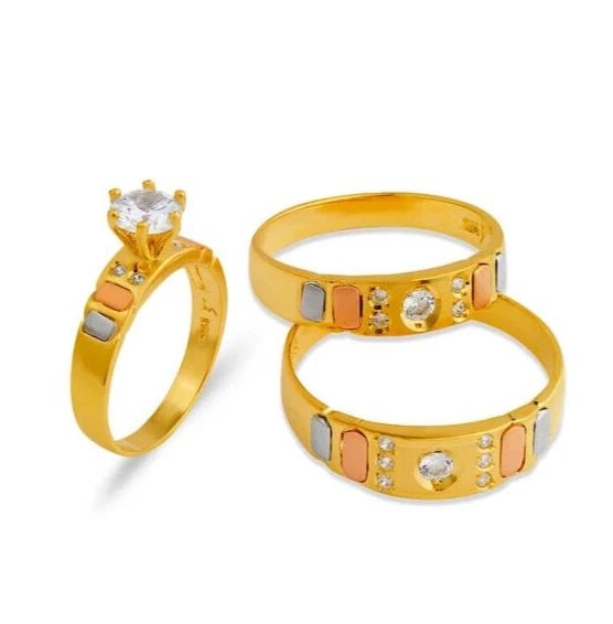NEW 14K TRI COLOR GOLD WEDDING TRIO RING SET: NEW 14K TRI COLOR GOLD WEDDING TRIO RING SET 14K Tricolor Gold Ladies band and engagement ring is size 7 Men's ring is size 10 Rings Also Sold Separately Weight: 7.6 Grams