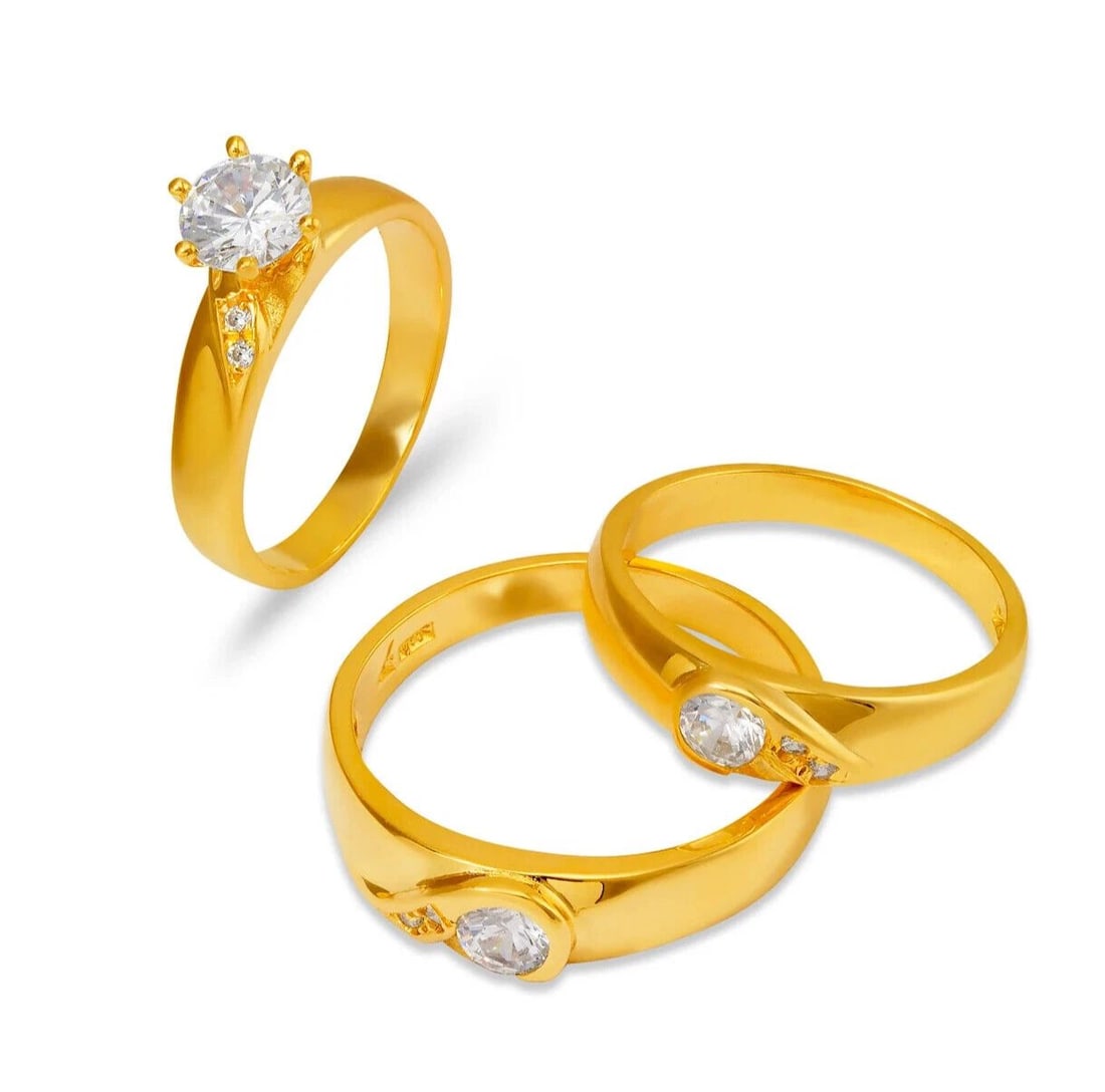 NEW 14K YELLOW GOLD WEDDING TRIO RING SET: NEW 14K YELLOW GOLD WEDDING TRIO RING SET 14K Yellow Gold Ladies band and engagement ring is size 7 Men's ring is size 10 Rings Also Sold Separately Available in White Gold Weight: 6.9 Grams